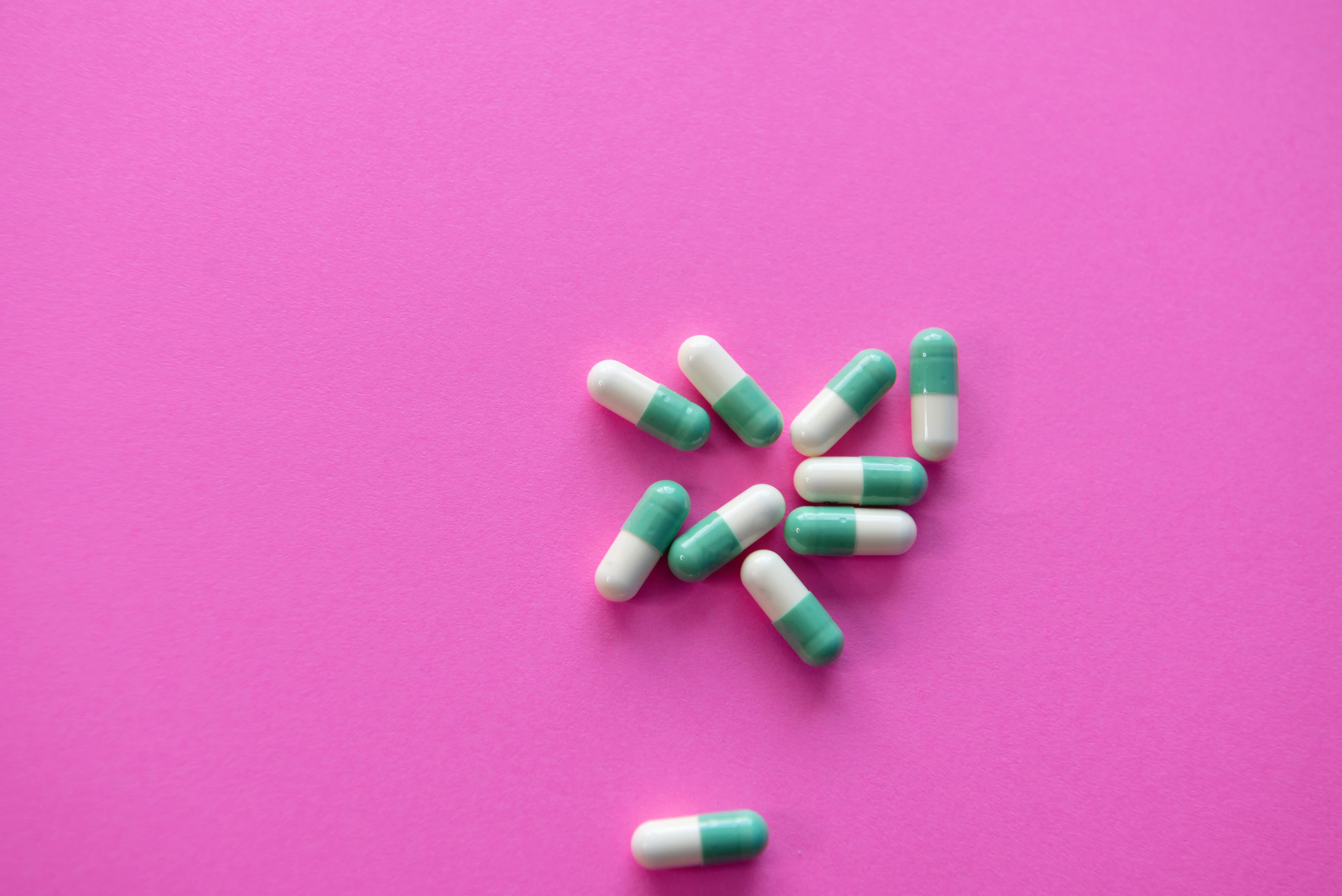 Pink bg capsule pills green white